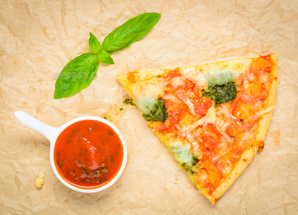 Pizza Slice with Tomato Sauce and Basil