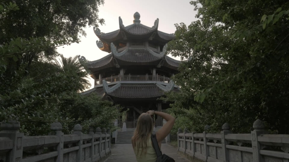Tourist Shooting Bell Tower Of Bai Dinh Temple, Vietnam alt