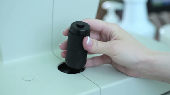 Unrecognizable Female Doctors Arm Operating With Medical Equipment In Modern Research Lab. alt