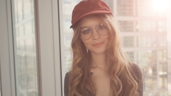 Pretty Young Woman In Glasses Smiling Happy Looking At Camera