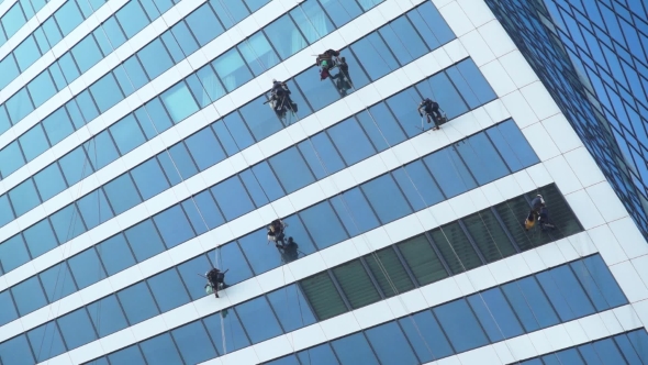 Window Washers Working On Skyscraper