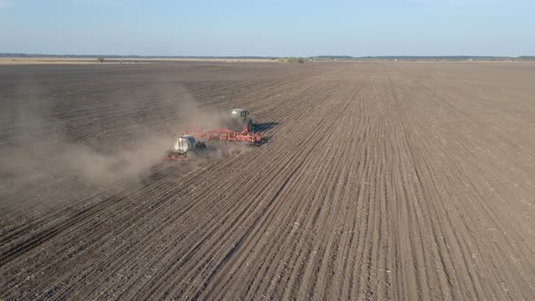 Tractor with Trailed Agricultural Machinery Plowing and Apply Fertilizers alt