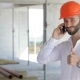 Construction Engineer Talking On The Phone At The Building Under Construction - VideoHive Item for Sale