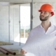Architector Looks At The Plan Of The Building Under Construction - VideoHive Item for Sale