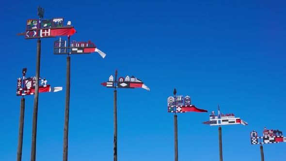 Wooden Carved Weather Vanes Swaying In The Wind