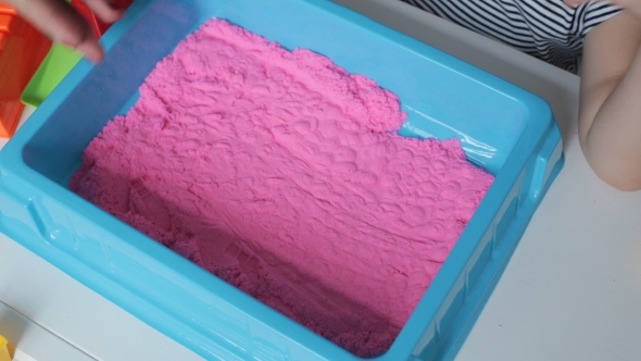 Kinetic Sand With Hands