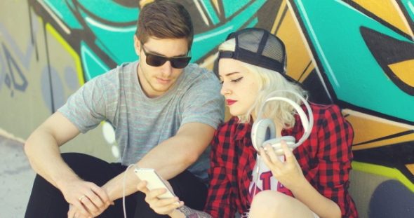 Fun Young Hipster Couple Listening To Music alt