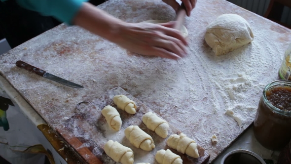 Female Hands Kneading Dough In Flour alt