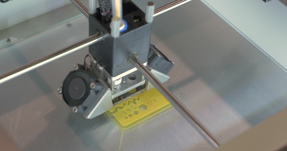 3D Printer Prints a School Ruler alt