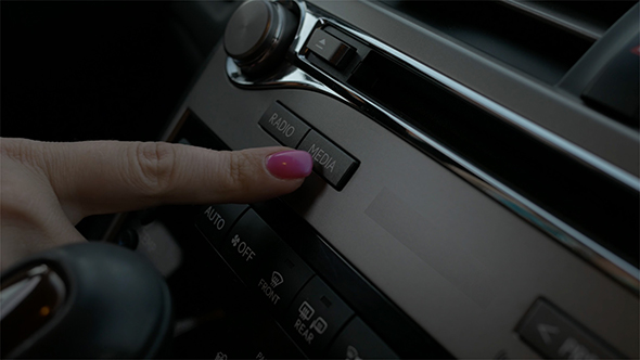 Car Interior Female Hand Typing Media Button alt