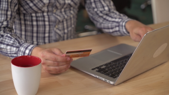 Businessman Typing Numbers On Computer alt