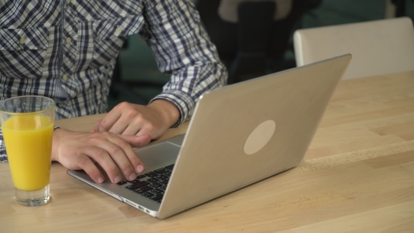 Male Typing Data On Laptop alt