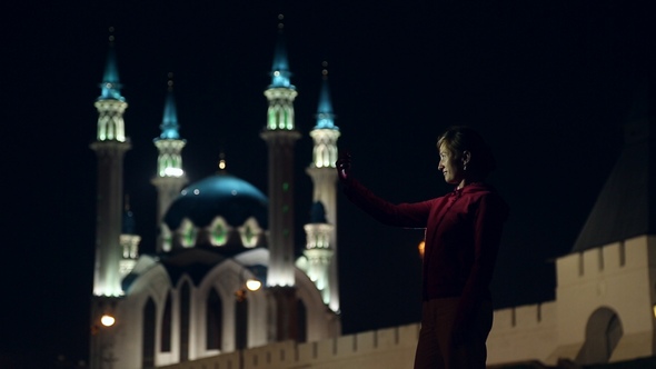 The Girl is Photographed, She's Taking a Selfie alt