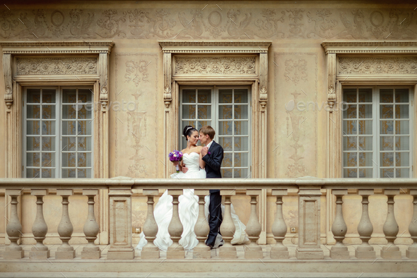 Wedding couple indoors is hugging each other - Stock Photo - Images