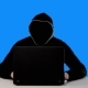 Anonymous Hacker In Black Hood With a Laptop - VideoHive Item for Sale