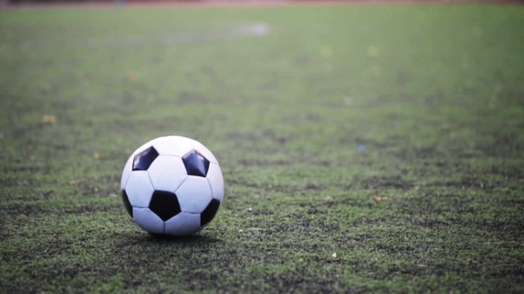 Football Player Playing With Ball On Field, Stock Footage | VideoHive