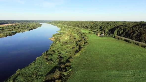 Aerial Landcape Of River In Green Meadows