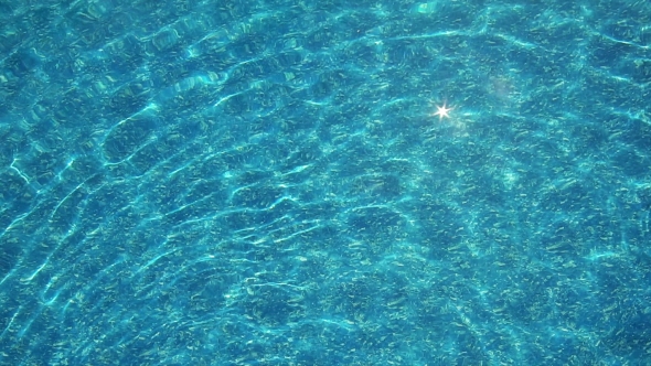 Background Of Rippled Pattern Of Clean Water In Swimming Pool