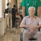 Doctor Pushes Wheelchair With Patient At The Hospital - VideoHive Item for Sale