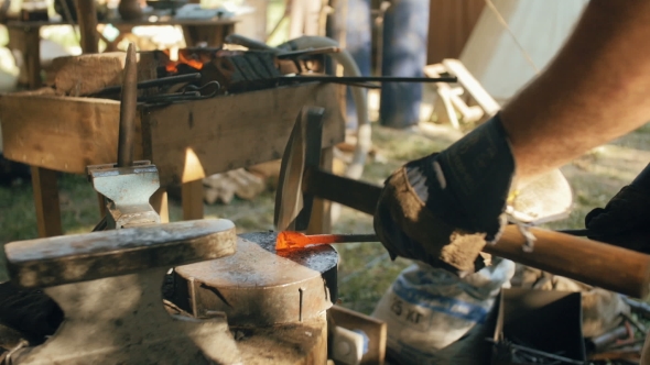 Blacksmith Forges Metal.