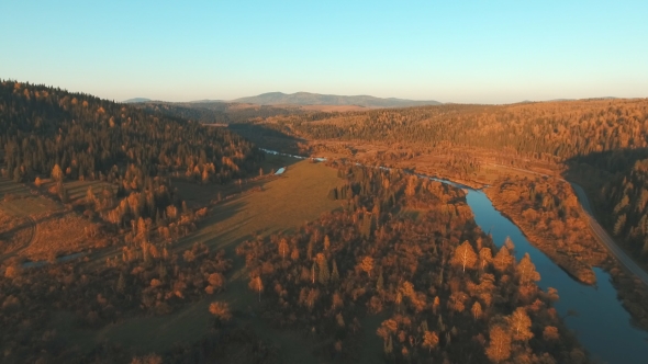 Aerial View Of The Mountain River. Country Landscape At Sunset.