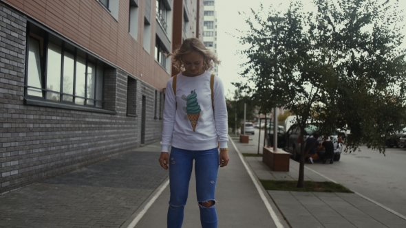 Young Woman Riding In The Park On Electric Scooter. Youth, Fun, Relax alt