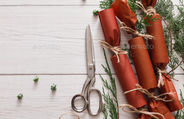 Creative hobby. Handmade christmas garland candies from paper - Stock Photo - Images