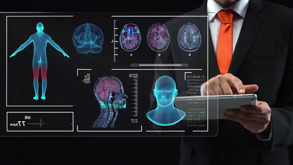 Doctor Looking Futuristic Tablet and Working at Technological Medical Digital Holographic Monitor alt