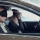 Young Woman Going For a Test Drive In a New Car Using VR - VideoHive Item for Sale