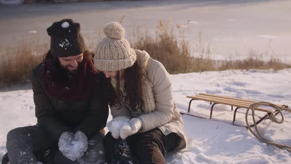 Couple Having Fun in Winter Outdoors alt