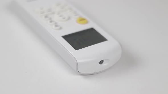 Air Conditioner Remote Control In The Table alt