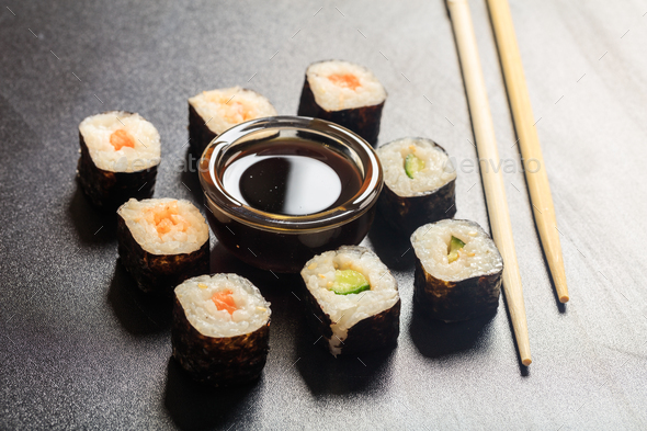 Sushi rolls on a black surface Stock Photo by rawf8 | PhotoDune