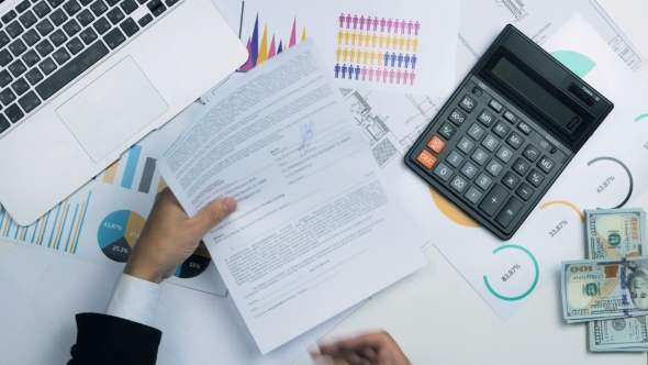 Businessman Sign Document And Give Money Cash Us Dollar Bills Payment To Anoyher Man. Top View. alt