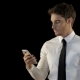 Man Looks At His Smartphone - VideoHive Item for Sale
