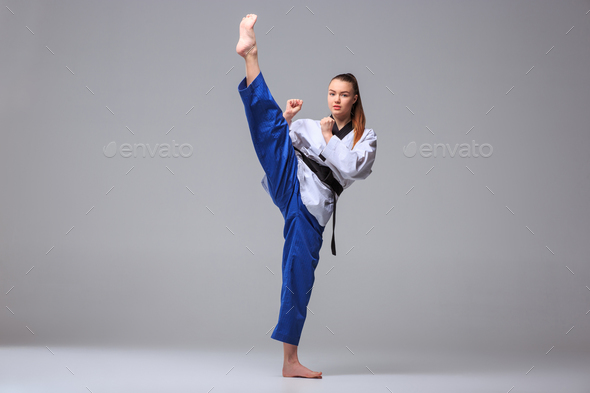 The karate girl with black belt Stock Photo by master1305 | PhotoDune