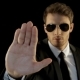 Guy Styled Like Security Raise His Arm Up - VideoHive Item for Sale