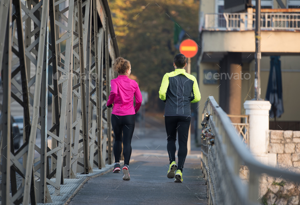 young  couple jogging - Stock Photo - Images