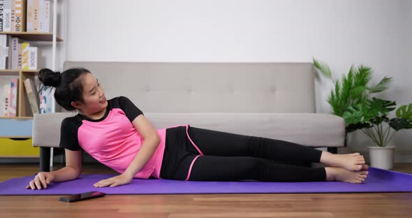 woman practicing yoga alt