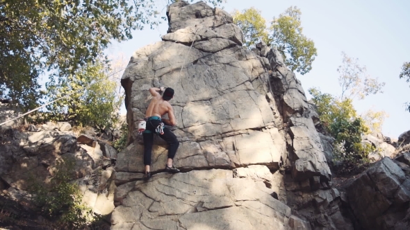 Strong Topless Climber Breaks Down alt