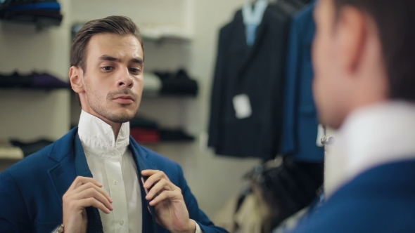Man Tying a Tie At Boutique, Stock Footage | VideoHive