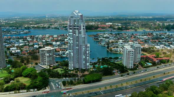 Flying backwards revealing a view of Macintosh island ending on the Beach. alt
