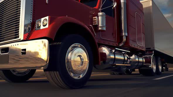 Huge semi-trailer cargo truck riding on the highway. Zoom-out animation. HD alt