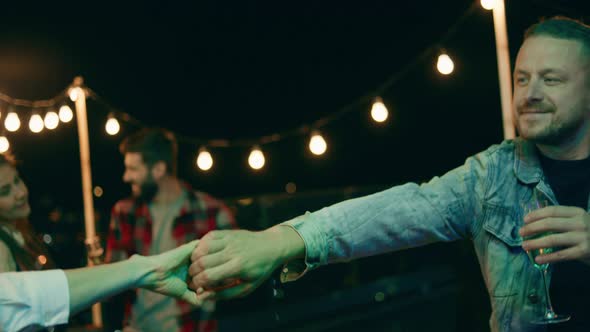 Multiracial People Have Fun on the Terrace on alt