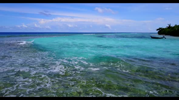 Aerial drone seascape of luxury bay beach trip by clear lagoon with white sand background of a dayou alt