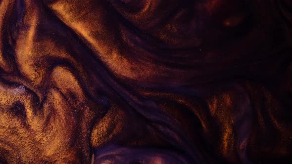 Golden Ink in Water. Art Backgrounds. alt