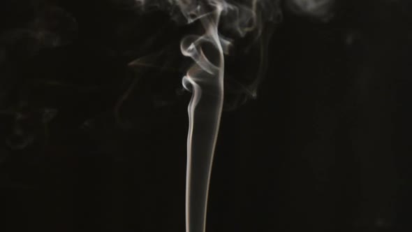 incense smoke on dark background