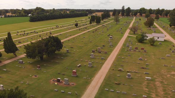  Aerial View Of Tranquil Cemetery In A Countryside.