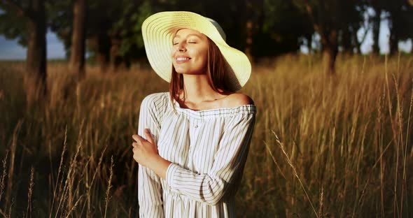 Portrait of Happy Woman on Field