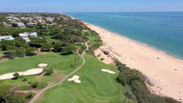 Aerial Video Shooting of a Tourist Village on the Atlantic Ocean with Golf Courses Vale De Lobo alt