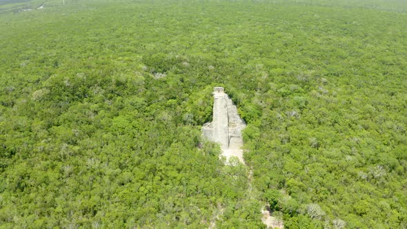 Aerial View of the Mayan Pyramids in the Jungle of Mexico Near Coba alt